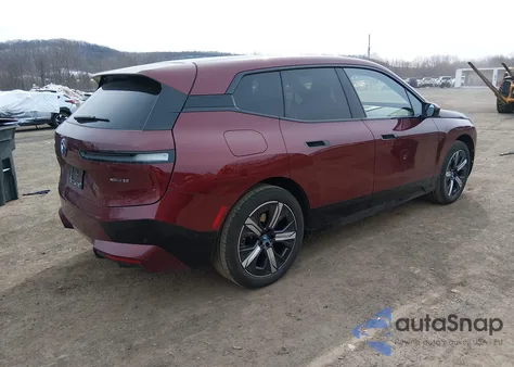 2025 BMW Ix xDrive50 из США, поврежденный, VIN WB523CF05SCU24117